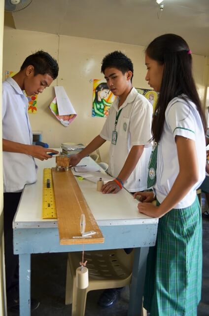 students doing physics laboratory activity