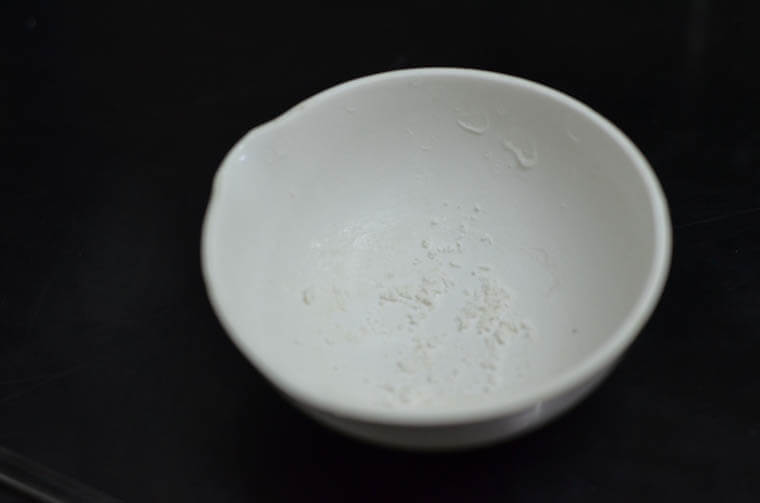 salt in evaporating dish